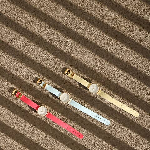 Pale blue/cream and gold women's watch